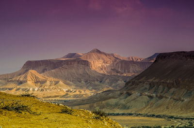 Idyllic shot of rocky mountains at negev against sky during sunset