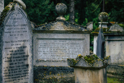 Text on stone at cemetery