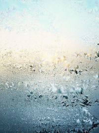 Close-up of water drops on white background