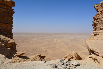 View of desert against clear sky