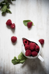 Close-up of raspberries in bowl on table