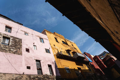 Low angle view of buildings against sky