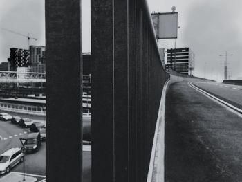 Road amidst buildings in city