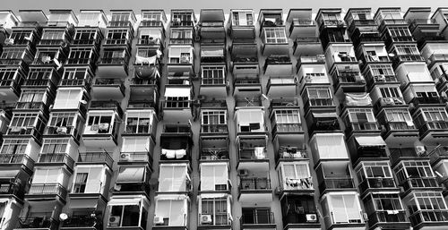 Full frame shot of balconies in building