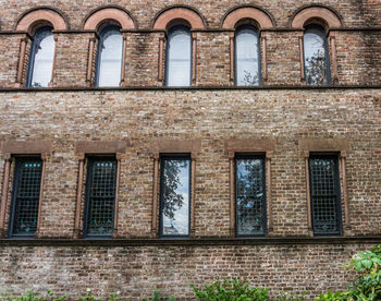 Windows on an historic brick building in charleston, south carolina