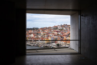 Cityscape seen through window