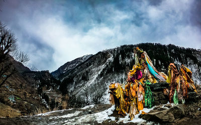 Panoramic view of snowcapped mountains against sky