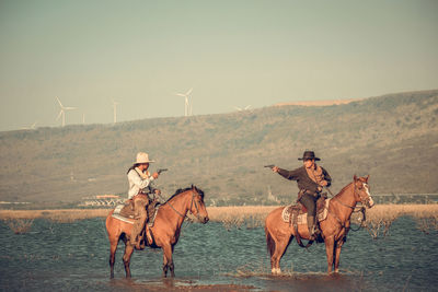 Horse riding horses