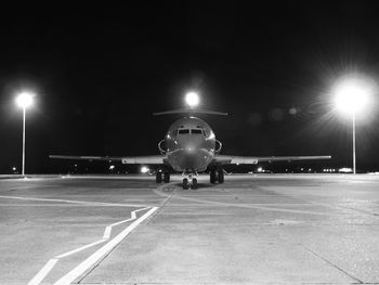 View of airport runway at night