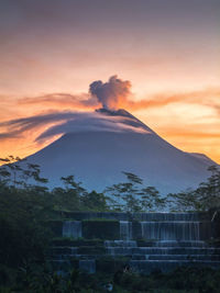 The beauty of mount merapi in the morning from grojogan watu purbo