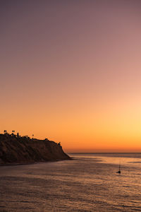 Scenic view of sea against clear sky during colorful sunset on the southern california coastline
