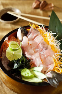 Close-up of fruits in plate on table