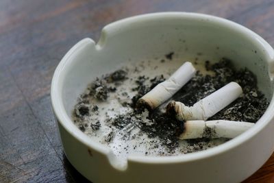 Close-up of cigarette on table