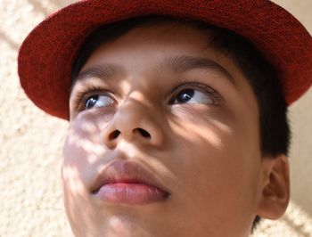 Close-up portrait of boy looking away