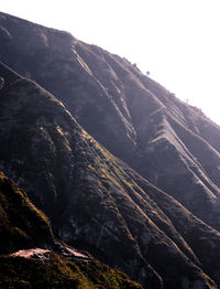 Low angle view of mountain against clear sky