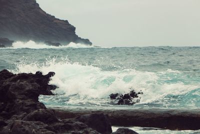 Scenic view of sea against clear sky