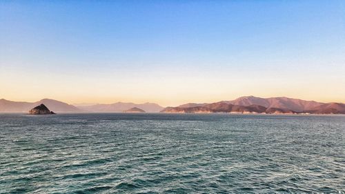 Scenic view of sea against clear sky