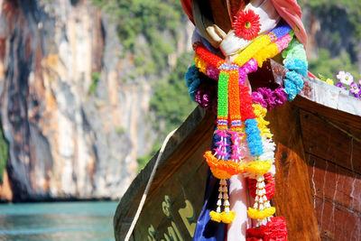 Long-tail boat decorated with garland