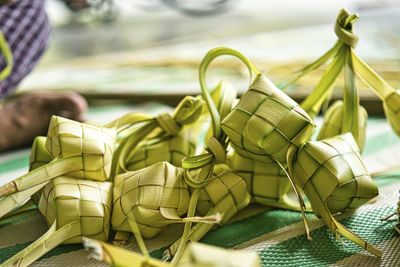 A bunch of ketupat, a traditional malay cuisine made with the coconut leaves for eid celebration.