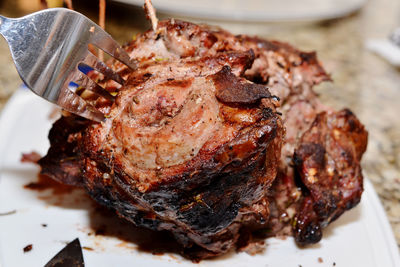 High angle view of meat in plate on table