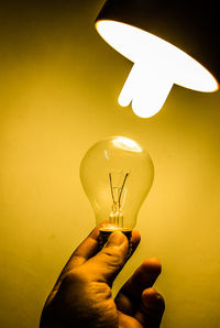 Close-up of illuminated light bulb