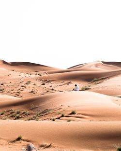 Scenic view of desert against clear sky