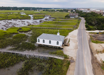 High angle view of road amidst buildings