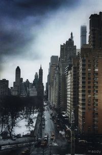 Buildings in city against sky