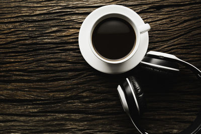 High angle view of black coffee on table