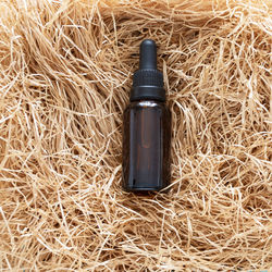 High angle view of bottle against black background