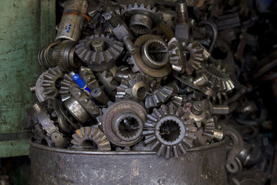 Close-up of machine parts in container