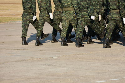 Army soldiers standing on road