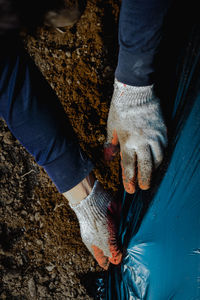 Low section of man working