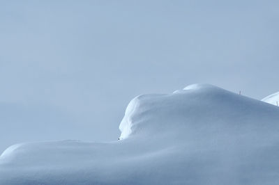 Scenic view of snowcapped mountain against sky