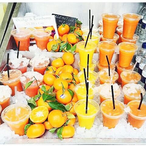 food and drink, indoors, still life, variation, food, freshness, healthy eating, large group of objects, table, choice, fruit, arrangement, abundance, for sale, retail, glass - material, shelf, orange color, yellow, container