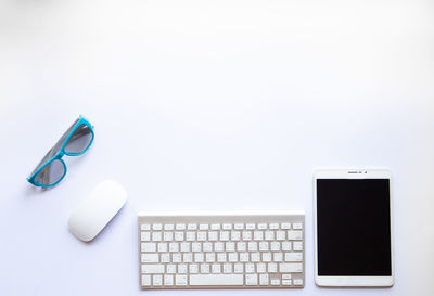 Close-up of mobile phone on table