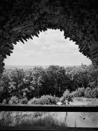 Scenic view of landscape seen through window