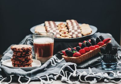 Close-up of fruits in plate on table
