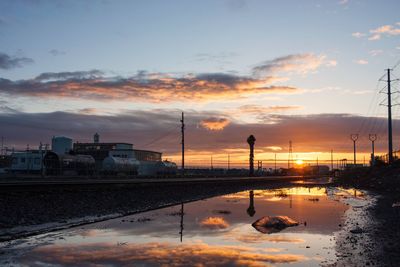 Scenic view of sea against romantic sky at sunset