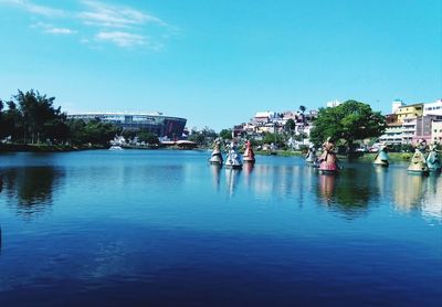 View of swimming pool against blue sky