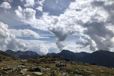 Scenic view of landscape and mountains against sky