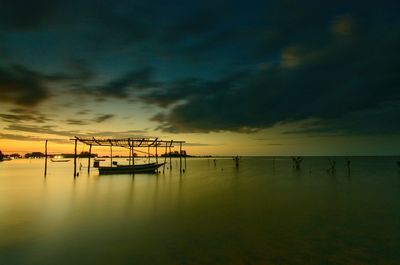 Scenic view of sea against sky at sunset