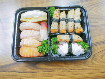 High angle view of sushi served on table