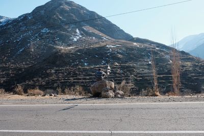 View of horse on mountain road