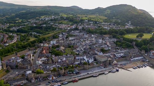 High angle view of river amidst buildings in town