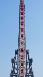 Low angle view of built structure against clear blue sky