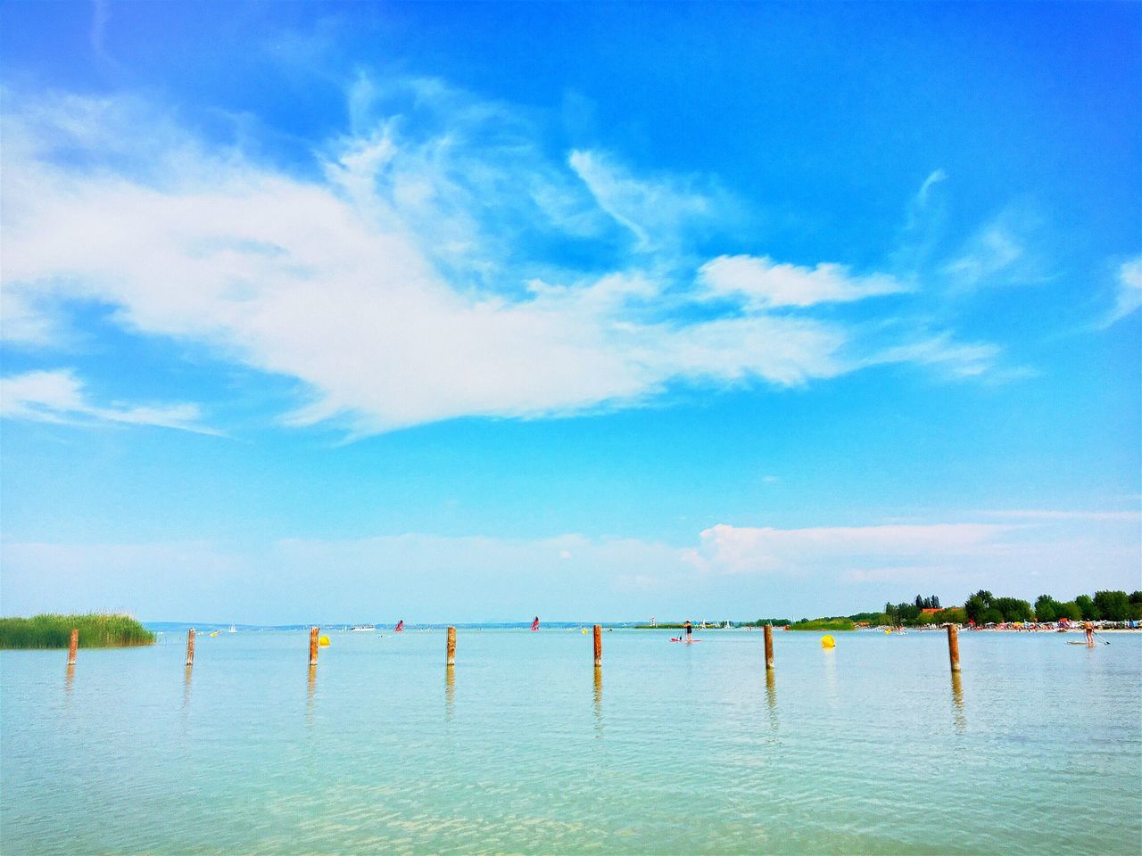 SCENIC VIEW OF CALM SEA AGAINST CLOUDY SKY