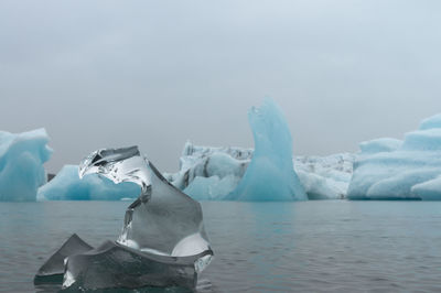 Scenic view of frozen sea against sky