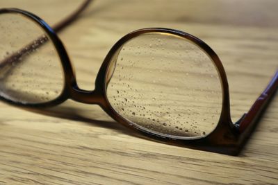 Close-up of sunglasses on table