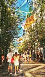 People walking on street in city